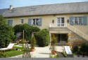 A restored stone building less than 6 km from the Bayeux Tapestry Museum